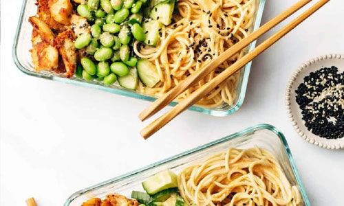 Sesame Noodle Bowl Classic garnished with scallions and peanuts